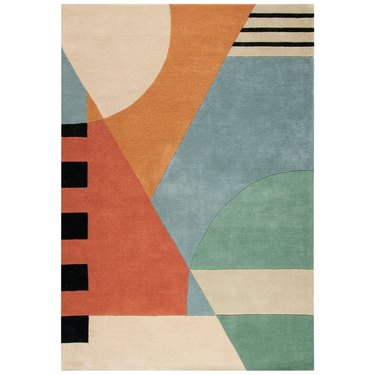 tufted rug in abstract patterns and colors