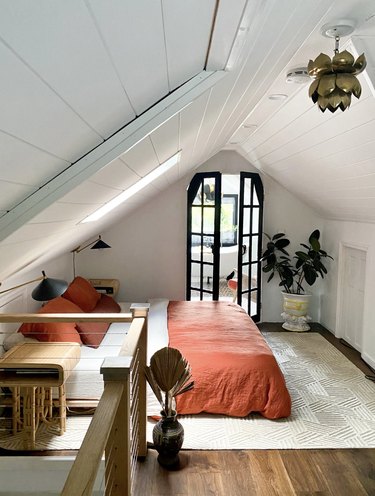 terra cotta bedding in white bedroom