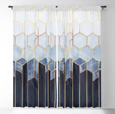 Society6 Soft Blue Hexagon Blackout Curtains, $139