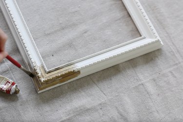 Painting picture frame with gold gilding wax