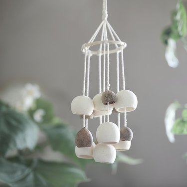 Hanging decoration with brown and cream bulbs hanging from string