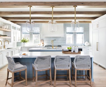Coastal blue and wood kitchen with double island