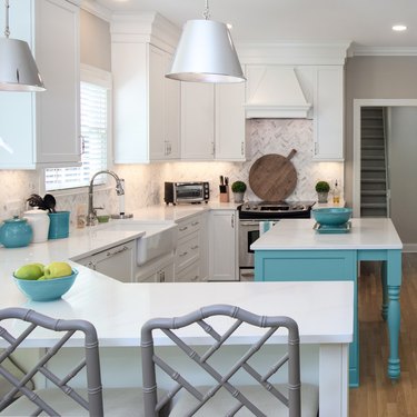 Cool white, gray and turquoise kitchen with island
