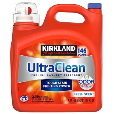 The Kirkland Signature Ultra Clean Free and Clear detergent, which comes in a large orange bottle.