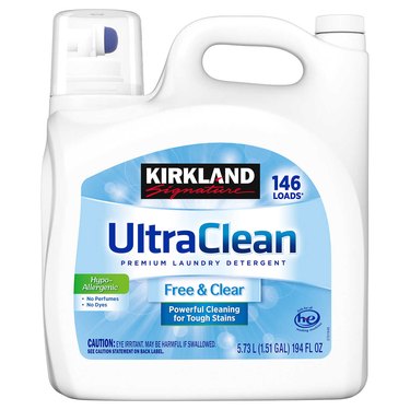 The Kirkland Signature Ultra Clean Free and Clear detergent, which comes in a large white bottle.