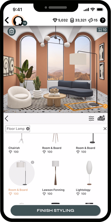 An iphone screen showing the Playhouse game that allows you to design a room with different pieces of real furniture.