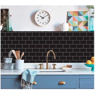 Black subway tile backsplash