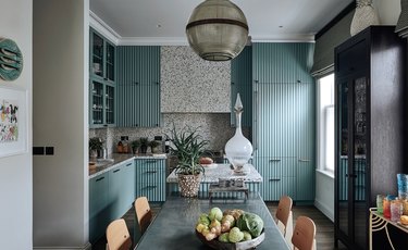 modern kitchen with blue reeded cabinets