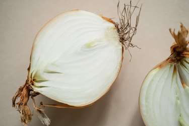 White onions on a light brown background