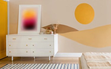 bedroom with sunrise mural