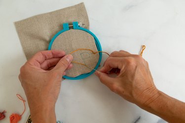 Chain stitch tutorial on linen napkin