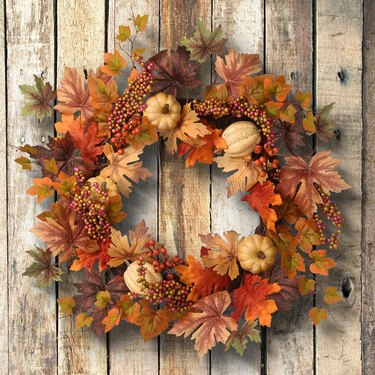 wreath with leaves and pumpkins