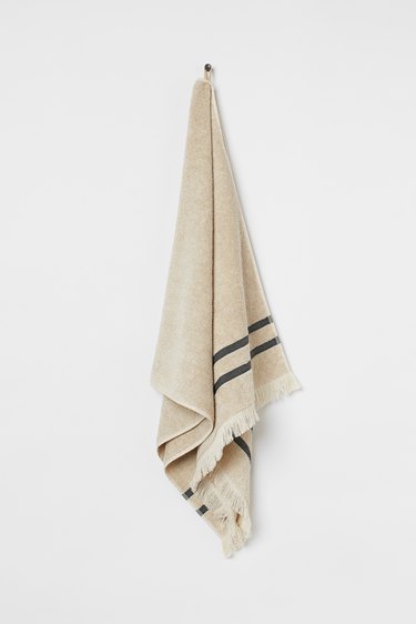 linen bath towel in beige with black stripes