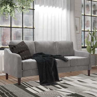 light gray three-seater sofa