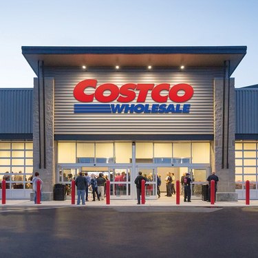 Costco storefront with logo and people outside