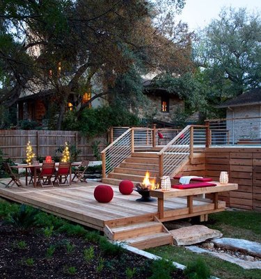 above ground pool with deck and fire pit