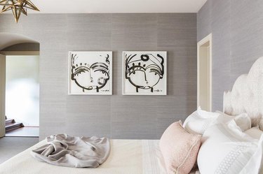 bedroom with gray walls and cream bedding