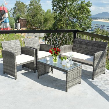 Patio set with white cushions