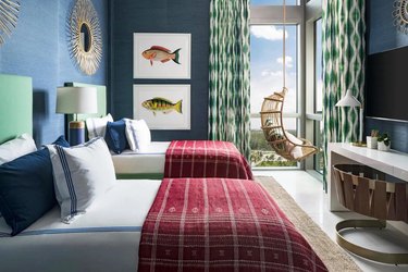 red, green, and blue bedroom idea with hanging chair