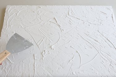 Creating texture on spackling with putty knife