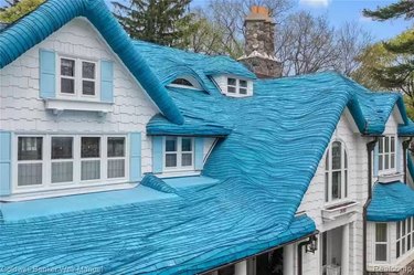 House with a blue thatched roof