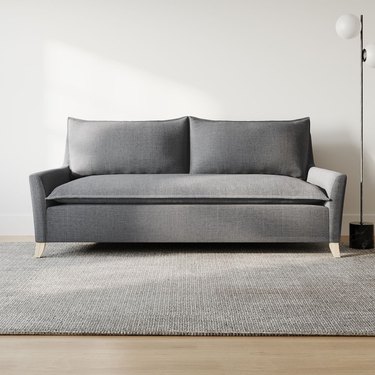 gray sofa with seams