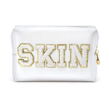 white embroidered pouch