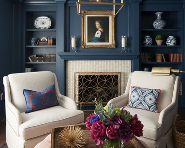 navy blue, tan and  coral living room