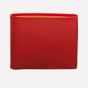A bright red Ettinger billfold wallet.