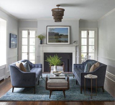 navy blue, tan, and teal living room