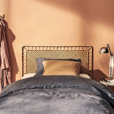 bedroom with rattan headboard