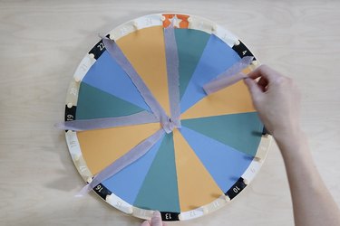 Pulling tape off painted IKEA kids activity wheel