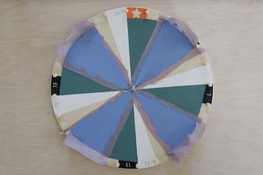 Four quadrants painted on IKEA kids activity wheel