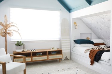 navy, tan, and light blue bedroom