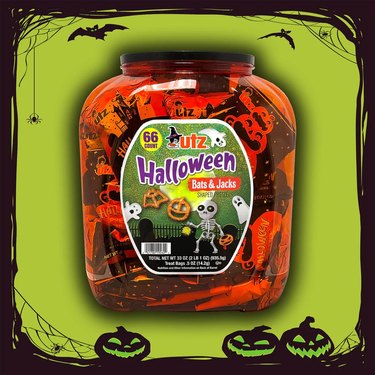Utz Halloween-shaped pretzels in a barrel on a green background with a black border.