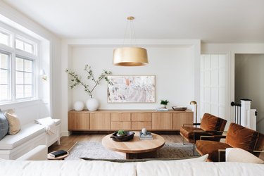 living room design with brass chandelier