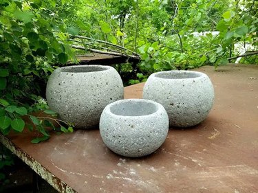 Hypertfua plant pots in a yard