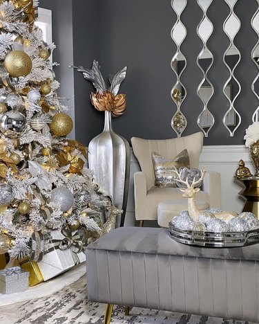 Gray livingroom with silver and gold chrismas decorations