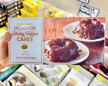 Hand holding Trader Joe's pumpkin sticky toffee cakes