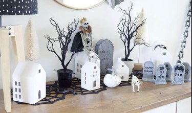 black and white display with houses Halloween color scheme