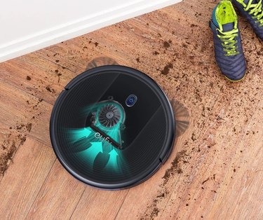 robot vacuum on dirty floor