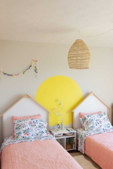 yellow geometric wall accent in children's room
