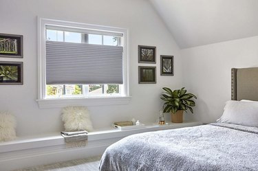 bedroom with blue cellular shades