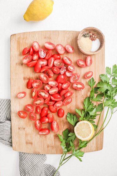 Slice grape tomatoes