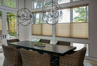 dining room with pleated shades