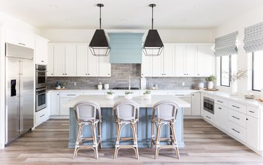 Slate gray backsplash with white kitchen cabinets