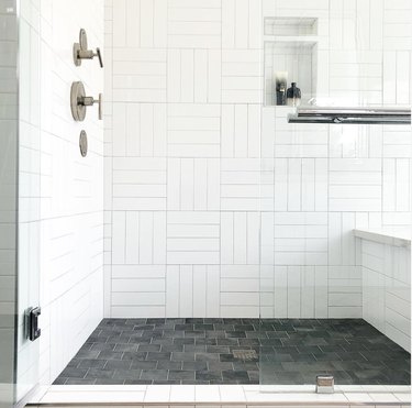 walk-in shower with white basketweave tile