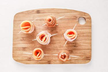 Secure meat and cheese rose with toothpick