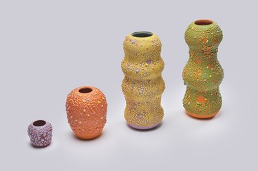 4 colorful vases in various sizes