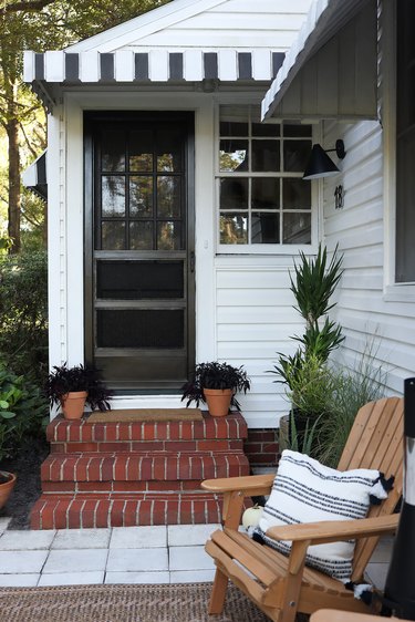 Door and screen door painted black